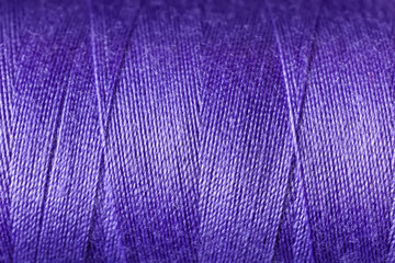Closeup view of purple threads as background