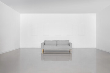 View of empty room with grey sofa