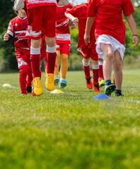 Young soccer players running