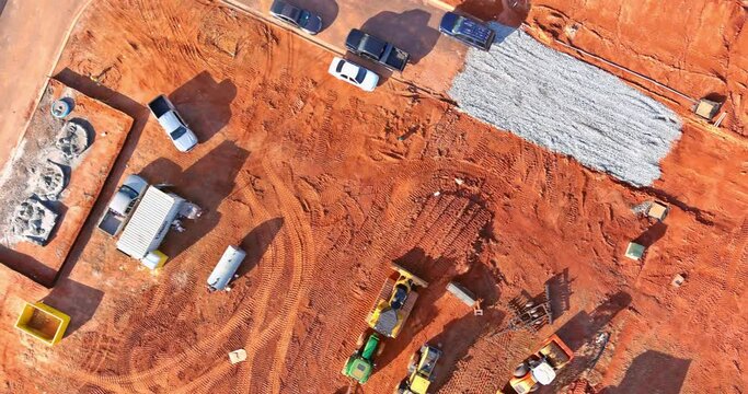 Building territory preparations construction of foundation for future apartment complex