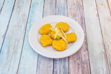 Fried nuggets serving served at a Pakistani kebab restaurant