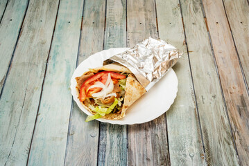 Simplifying a bit, shawarma is the Arabic version of the döner kebab that can be served in many...