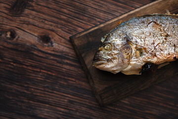 Baked Gilt-head bream (Sparus aurata). The fish is widely used in Mediterranean cooking, under a variety of names. In Tunisia, it is known locally as Dorate. In Spain, it is known as Dorada.