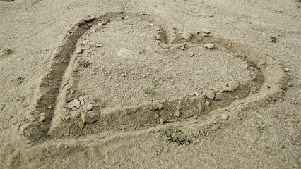 Heart Drawn on the Sand and Mud Ground - Heart Drawn on sand surface