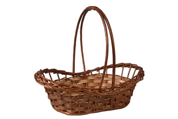 Fototapeta na wymiar handmade basket braided from wicker reeds, isolated on white background