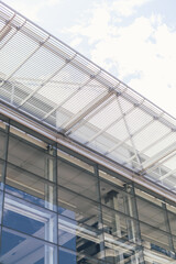 glass building with sky