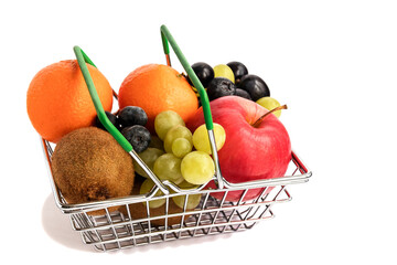 Trade metal basket with a variety of fresh fruits - tangerines, kiwi, grapes, apples, blueberries for a healthy diet.