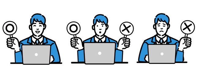 ラップトップの前でマルバツの札を持っているスーツを着た若い男性のセット
