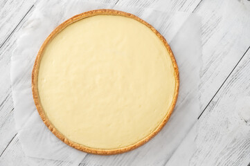 Traditional cheesecake on the wooden table - obrazy, fototapety, plakaty