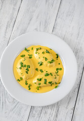 Quenelle with Hollandaise sauce