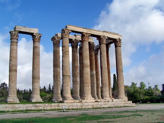 Fototapeta premium Columns and lintels on an ancient ruin an an archaeological park in Athens, Greece