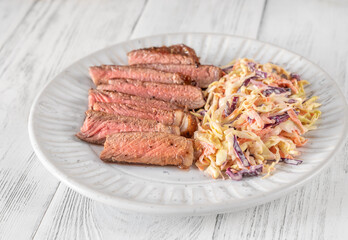 Beef steak with coleslaw salad