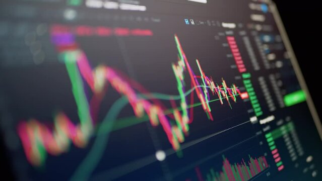 Trader Analyzes Candlestick Chart of Movement of Cryptocurrency on Screen PC. Online viewing of cryptocurrency quotes btc, eth chart in the application. Dynamics, statistics, stock exchange data.