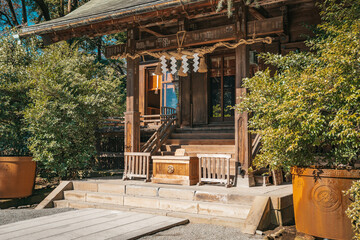Fototapeta na wymiar Japanese garden with prayer temple and water fountain