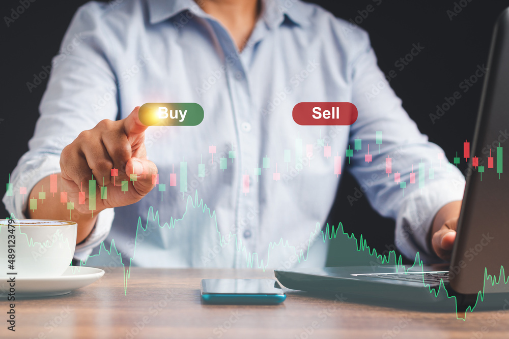 Poster hand of trader touch a button buy a stock market order on a virtual screen