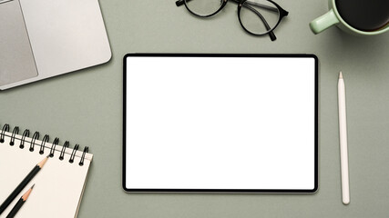 Modern office desk workspace with tablet white screen mockup.