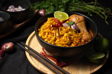 Khao Soi Kai,  Close-up Khao Soi Kai bowl served in restaurant.
