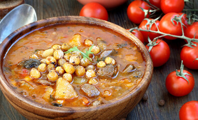 CHICKPEA AND BEEF STEW, soup with chickpeas and meat, hearty chowder, latin cuisine