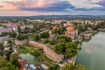Fototapeta na wymiar Aerial view of Tata castle in Komarom county Hungary, along the old lake with Gothic inner palace three angular bastions for cannons and a round rondel
