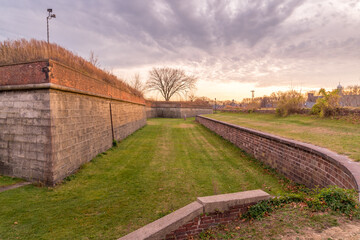 View of Fort Jay cannon bastion and dry moat, counterscarp on Governors Island  New York