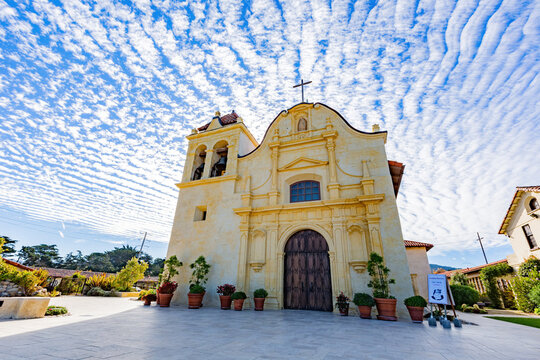 Sunny exterior view of the San Carlos Cathedral with beautiful clouds