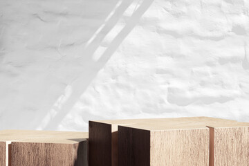 Wood log podium with whitewashed Santorini style cement wall with shadow of texture and leaves tree. 3D render mock for organic, natural, beauty, eco friendly product display background.
