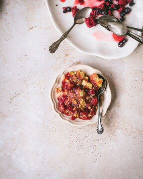 Berry crumble on a small detailed plate