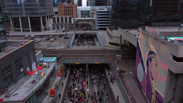 Crowd marching on street flyover bridge Calgary Protest 12th Feb 2022