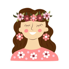 A beautiful young woman with a wreath of flowers on her head. Spring time. Happy International Women's Day. Portrait.