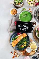 Healthy food assortment on light background.