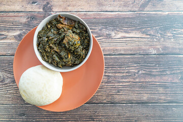 Nigerian Pounded Yam Served with Afang Soup ready to eat
