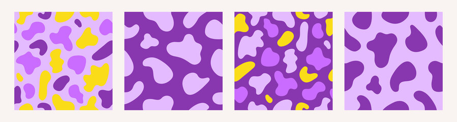 Trendy set seamless patterns of spotted animal skins. Abstract print in yellow violet colors. Vector illustration	