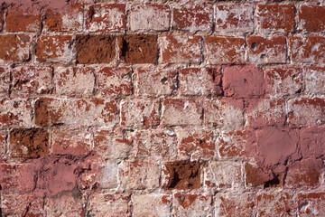 The texture of the old brick wall. 
