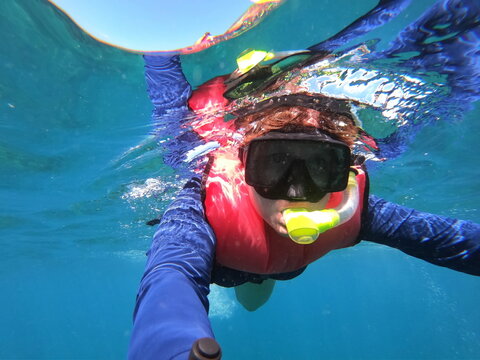 Closeup Of Senior Woman Snorkeling In Costa Rica