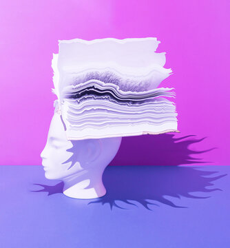 Human head with open book on blue and purple background. Surreal, education, study and knowledge concept