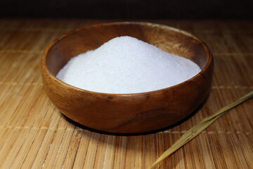 Zinc sulfate in the form of crystals in a wooden plate.