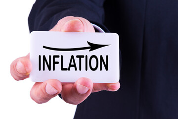business man holding banner with inflation graph and arrow