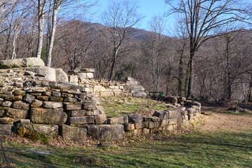 Ancient dolmen in Zhane river gorge on sunny day. Gelendzhik, Krasnodar Krai, Russia