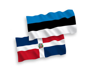 National vector fabric wave flags of Estonia and Dominican Republic isolated on white background. 1 to 2 proportion.