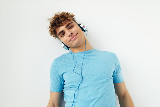 handsome young man music technology entertainment unaltered