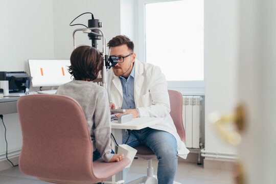 boy having eyesight test on clinic