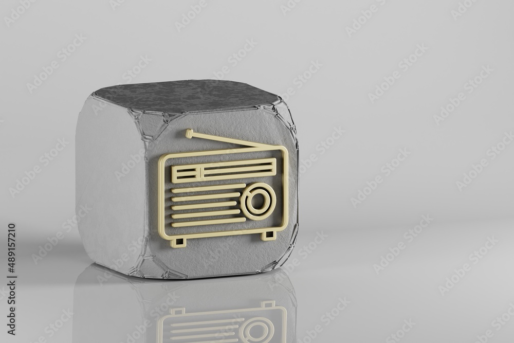 Poster old radio with short antenna icon. beautiful golden music symbol icons on a beton cube and white cer