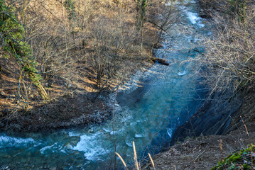 Waterfall on Zhane river on sunny winter day. Krasnodar Krai, Gelendzhik, Russia