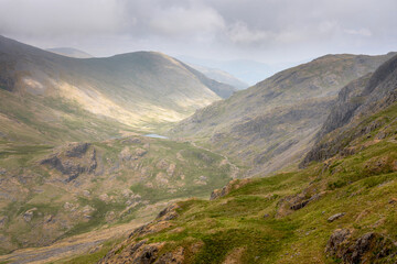 Mountain views of Green Gable, Base Brown, Sty Head and Styhead Tarn from the Corridor Route in the English Lake District UK.