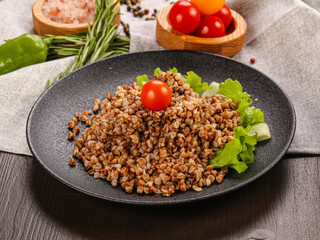Vegetarian superfood – boiled buckwheat in the plate