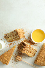 Concept of tasty food with honey cake, space for text