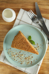 Concept of tasty dessert with honey cake, top view