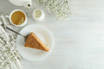 Concept of tasty food with honey cake, space for text