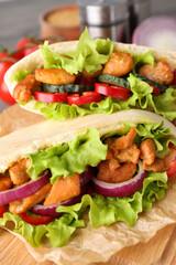 Concept of tasty food with pitas with chicken meat