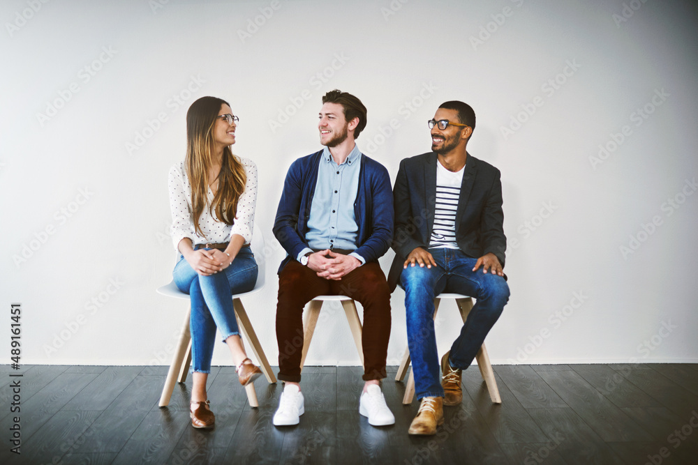 Canvas Prints Shes ready to make a great first impression. Shot of a group of young businesspeople waiting in line for a job interview.